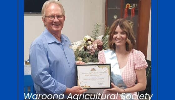 Jessica receives her certificate from the President Waroona Agricultural Society 